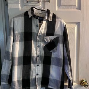 Brand new men’s Size Small Sherpa- lined black and white plaid shirt